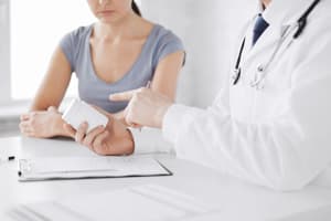 Prescription Medications doctor prescribing medication to patient with vicodin addiction