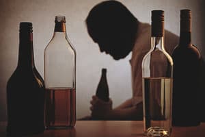 person abusing alcohol