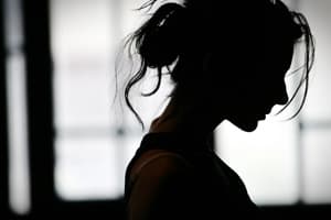 Symptoms of Ending Xanax Use Silhouette of woman with head down experiencing symptoms of quitting xanax