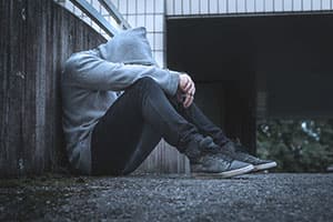 person suffering from historical trauma resulting in depression