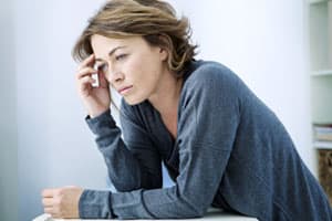 Sad woman thinking about getting sober. sad woman thinking about getting sober